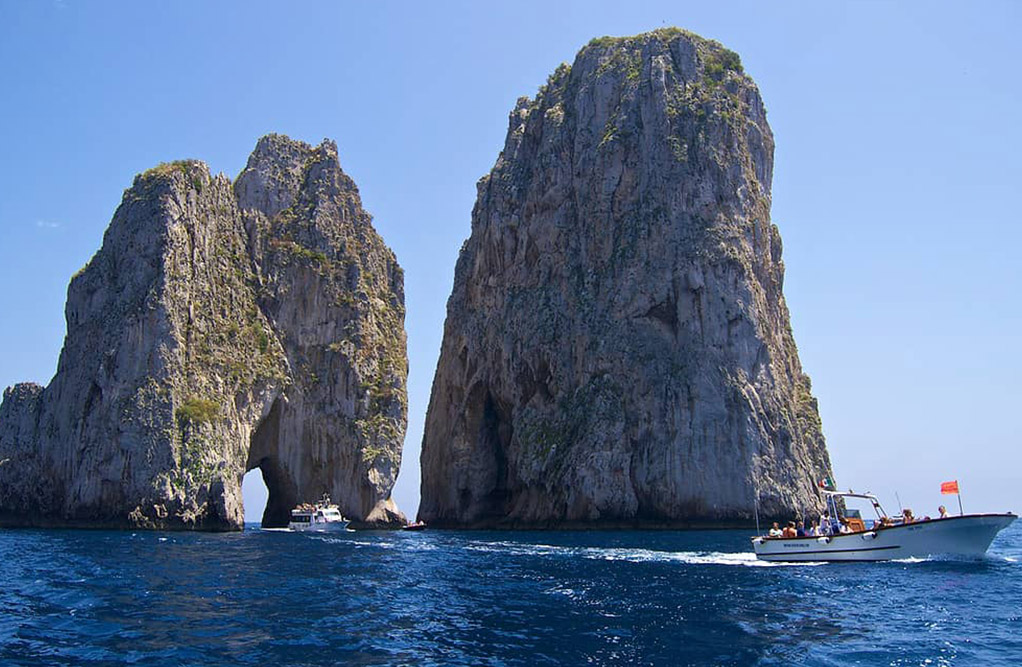 A picturesque view of Capri, Italy, showcasing its stunning coastal scenery and vibrant Mediterranean atmosphere.